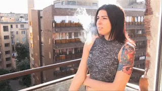 Kelly Smoking on Balcony