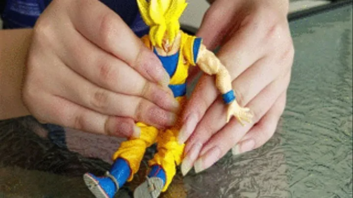 KNicole plays with Goku's tiny body