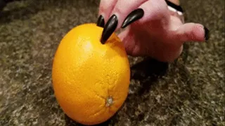 Laura cuts an orange!