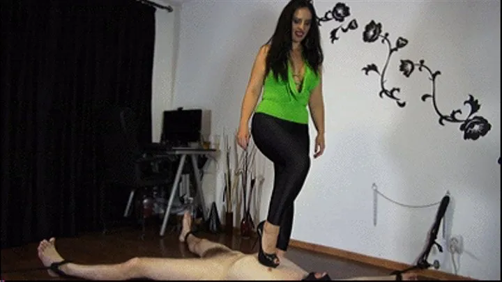 Foot meets balls: Mistress Ezada tormenting Her slave with Her feet