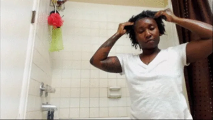Ebony washing her afro hair