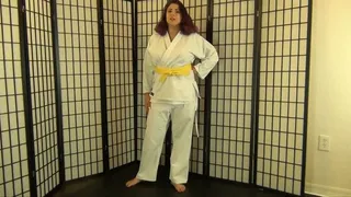 GIA LOVE EARNS HER ORANGE KARATE BELT