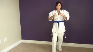 IVY DEMONSTRATES HER KARATE KICKS