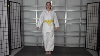 NATALIE CHARM EARNS HER ORANGE BELT