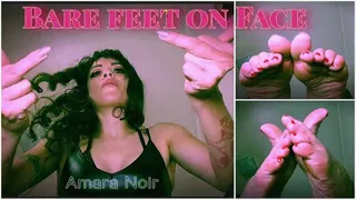 Bare feet on face