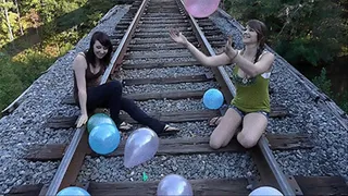 Balloon Popping on the Train Tracks with Dakota Charms and Pocahontas Jones