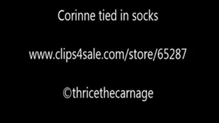 Corinne tied in socks