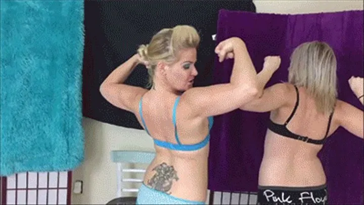 Whitney and Olivia lift each other