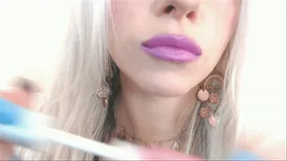 Applying Sexy Purple Lipstick and Gloss