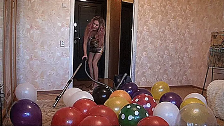 Housewife vacuuming pop all balloons