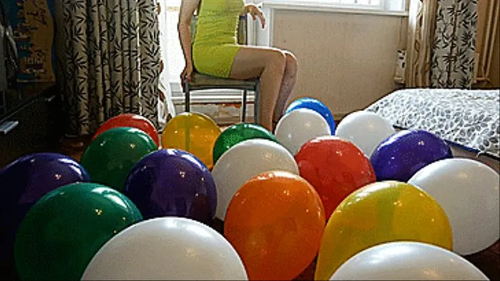 Angie sit pop all balloons on a chair