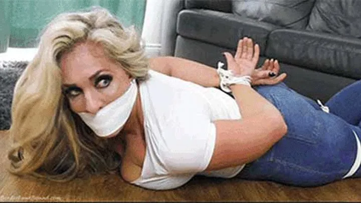 Kellie in: HideOut Desperado Jumps That Cop Good & Leaves Her Tied Up & Gagged With a Handkerchief Over Her Mouth!