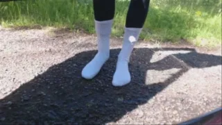 Muddy white socks