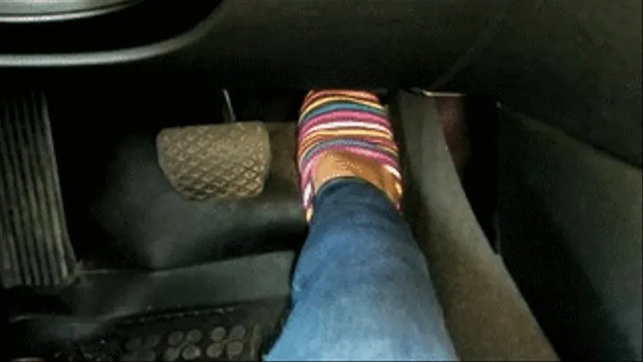 Pedal pumping in colored slippers (revving)