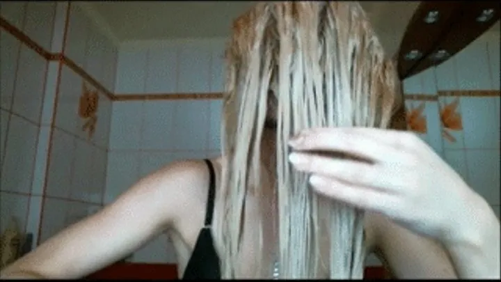 Brushing hair.