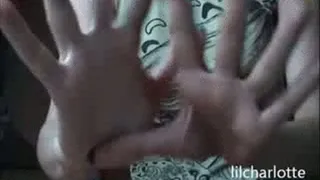 Gigantic hands smashing tomatos