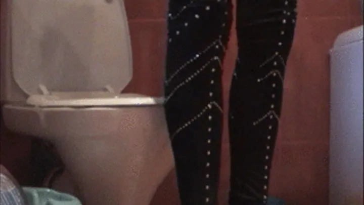 Toilet clip with shiny leggings and high heels.