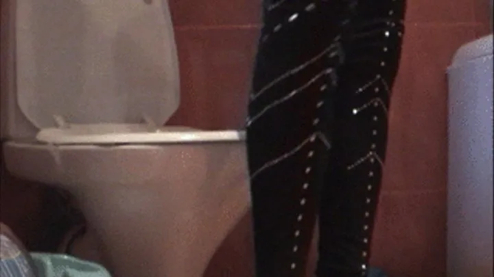 Toilet clip with shiny leggings and high heels..