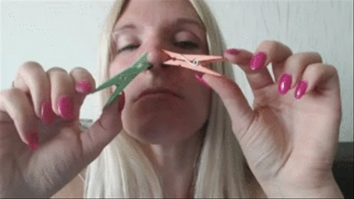 Nose pinching with pegs (silly faces)