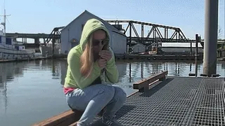 Ashley smokes at the marysville marina