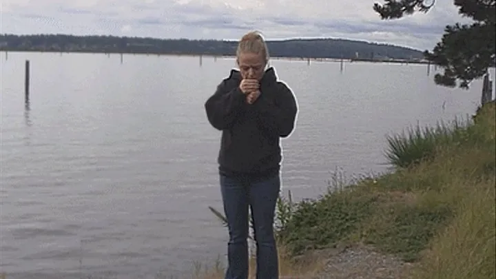 Ashley smokes on the water