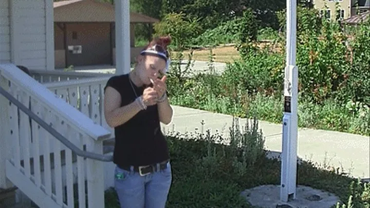 Redhead smoking outside