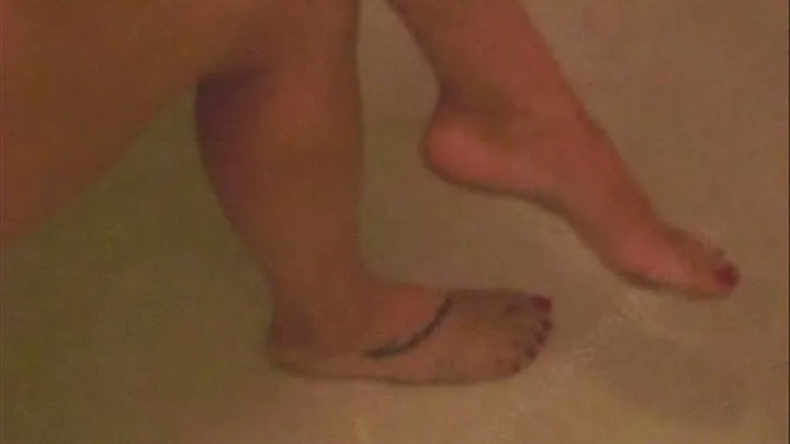 Tiffany Cleaning Her Dirty Feet in the Bathtub