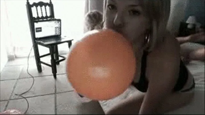 Two Naked Girls Popping Balloons