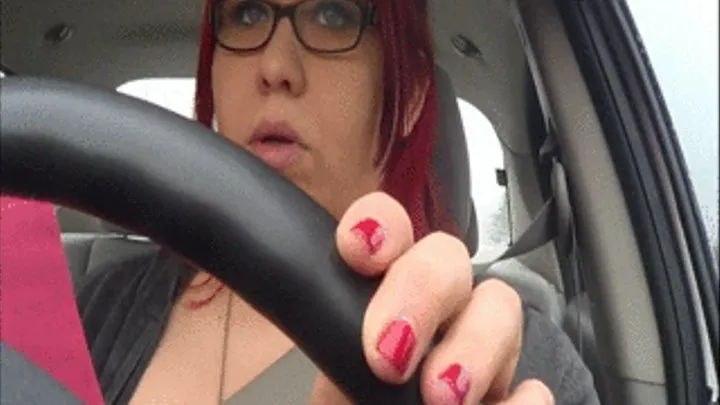 Red Nails on Steering Wheel