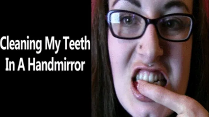 Cleaning My Teeth in a Hand Mirror