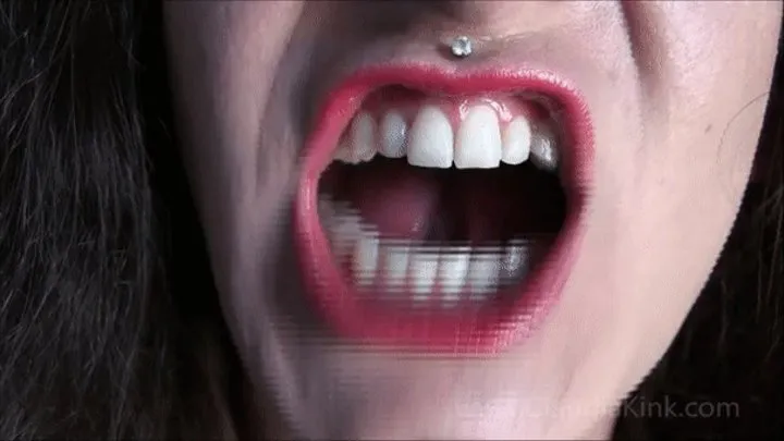 Claudia's Sharp White Teeth Up Close