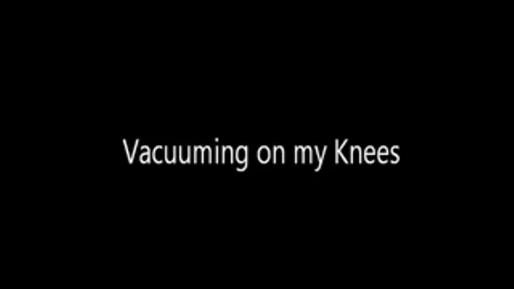 Kneeling and Vacuuming