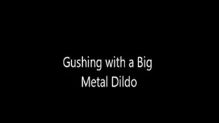 Gushing with a Metal Dildo