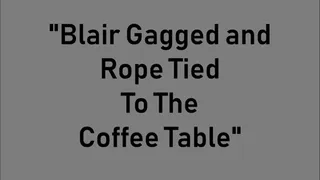 "Blair Gagged and Rope Tied To The Coffee Table"