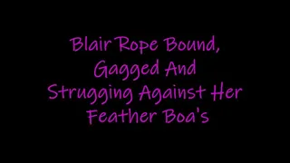 Blair Rope Bound, Gagged And Struggling Against Her Feather Boas