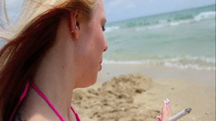 sunny marie smoking on the beach