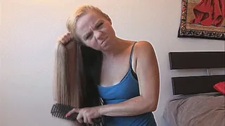 Petite Ashley brushes her long hair 2