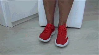 Toe wiggling in red sneakers Iv