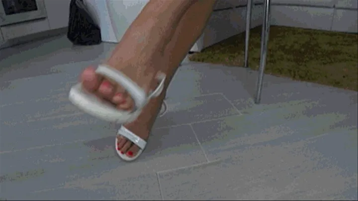 Dangling and toe wiggling in white summer sandals I