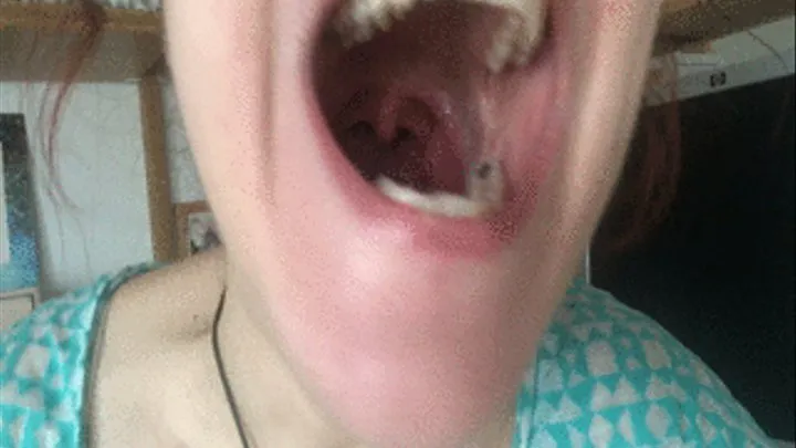 Long tongue, big tonsils and finger in mouth