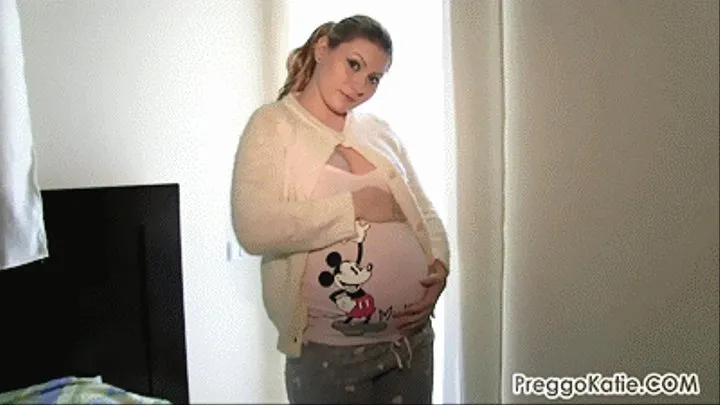 Pregnant girl in cardigan