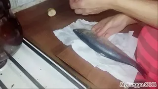 Pregnant Housewife Fucks Herself with a Fish!