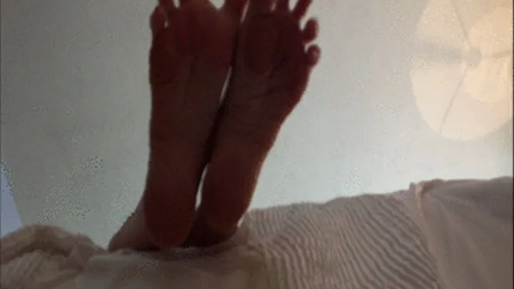 Now under Violet's soles and see high arches & wrinkled soles