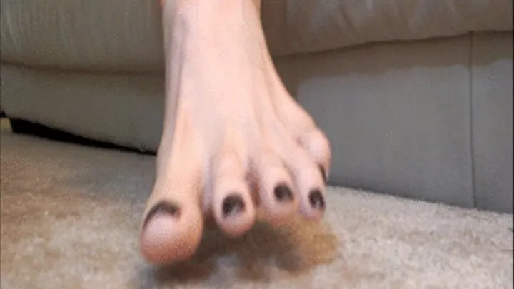 Foot jewelry and tight shot of long toes and soles