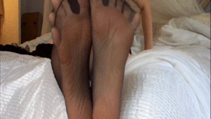 Sheer black nylon on long toes