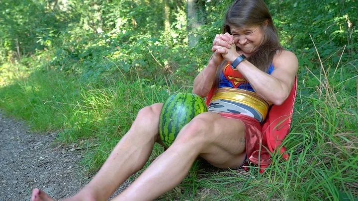 Emily Crushing A Watermelon