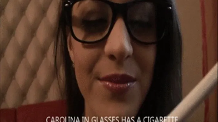 CAROLINA IN GLASSES HAS A CIGARETTE