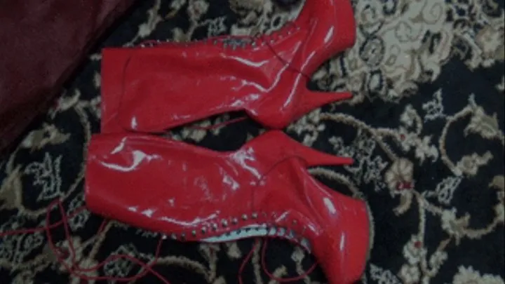 Mistress Raven Shows Off Her Red Pantent Leather Boots Part 1