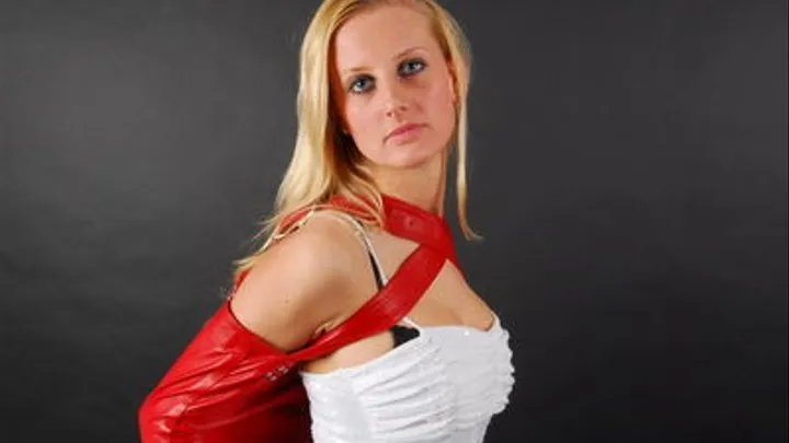 Shenenne in a red leather armbinder