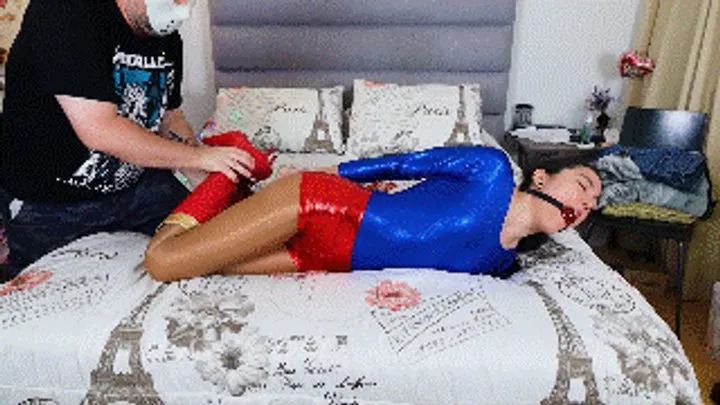 Khrystal is Ultragirl: A Superheroine tricked into bondage! PART 2